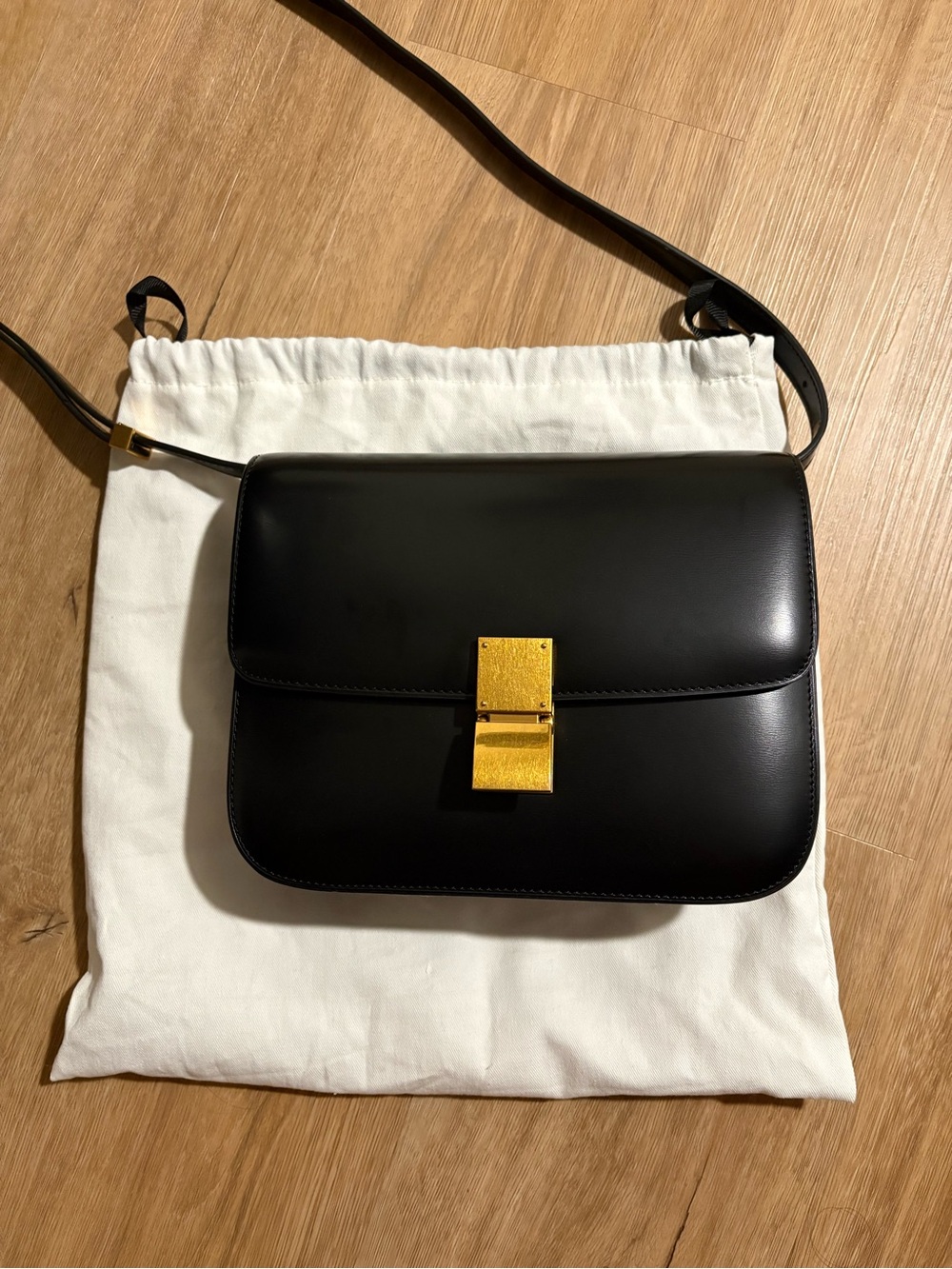 Classic Black Leather Crossbody Bag with Gold Hardware